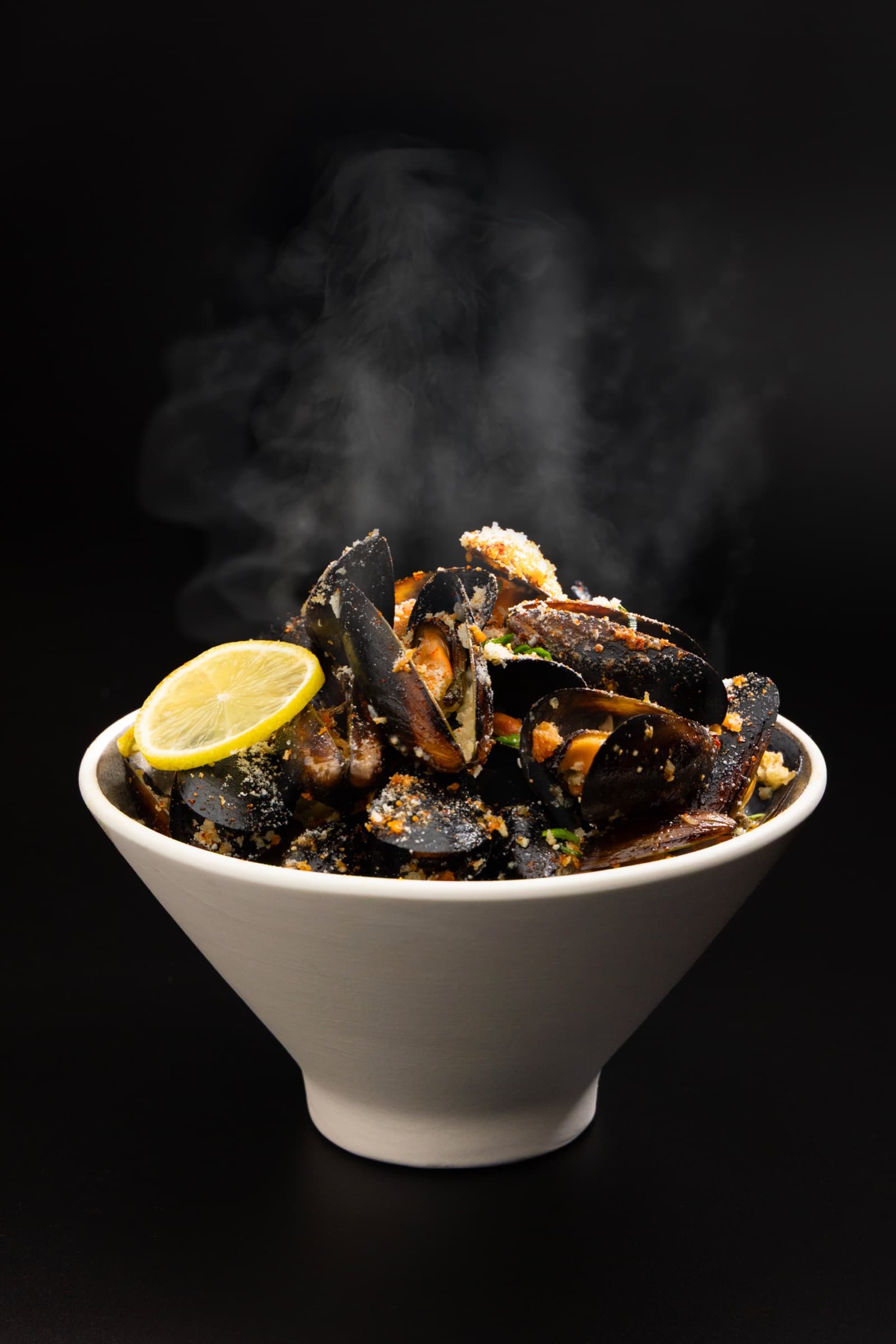 Garlic Butter Mussel Ramen bowl with steaming mussels